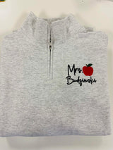 Teacher half-zip sweatshirt embroidery — detail view