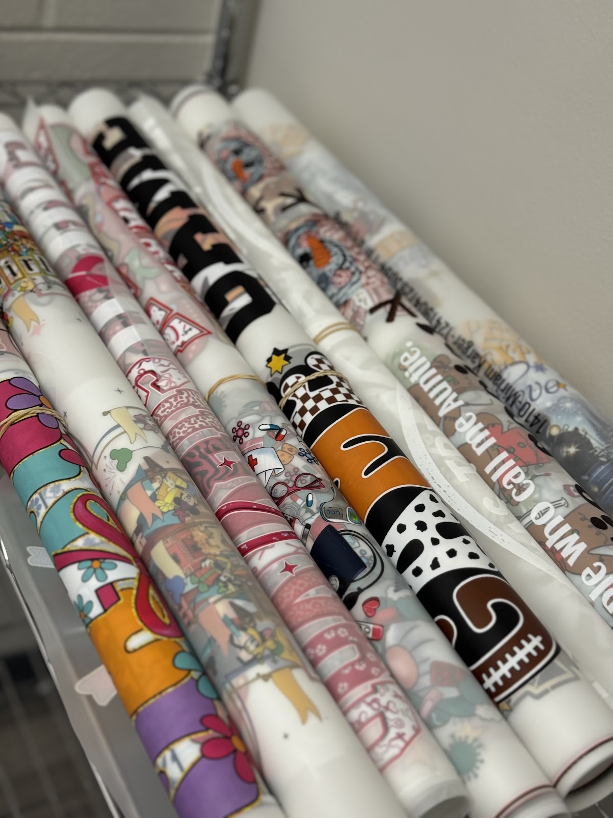 Printed DTF gang sheets rolled and ready for pickup at Print Press Co, Hoffman Estates IL