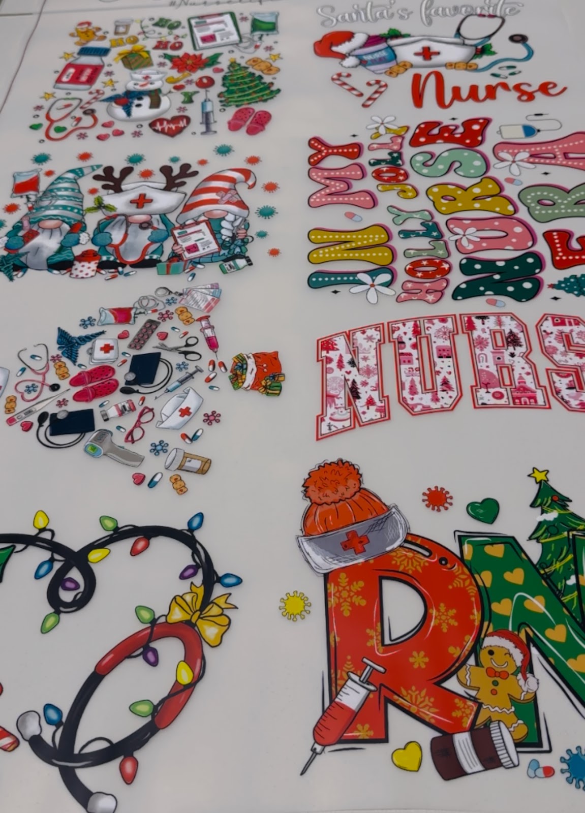 Full-color DTF transfer sheets printed in-house on commercial equipment