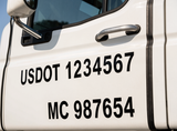 USDOT and MC number lettering on truck door