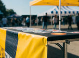 Event table with banner and stickers
