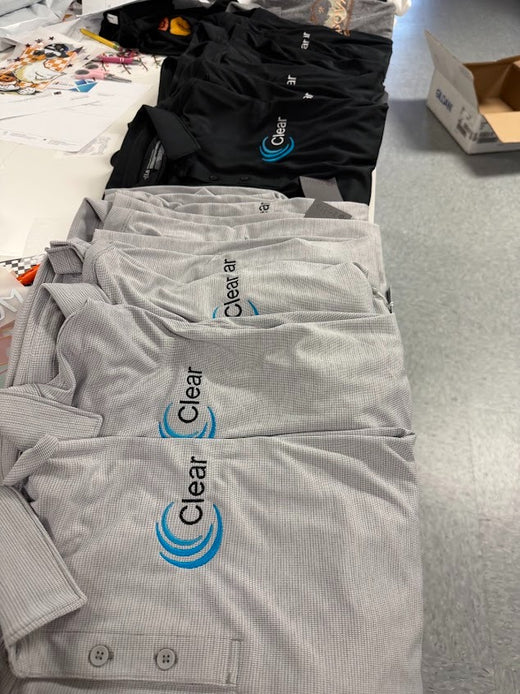Embroidered logo polos for a local café bulk order