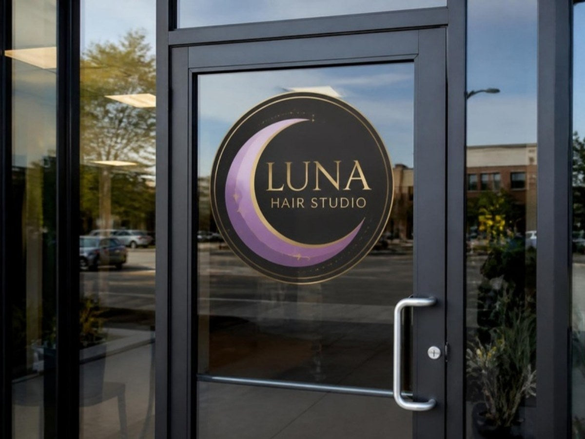Large full-color logo decal on a glass storefront door