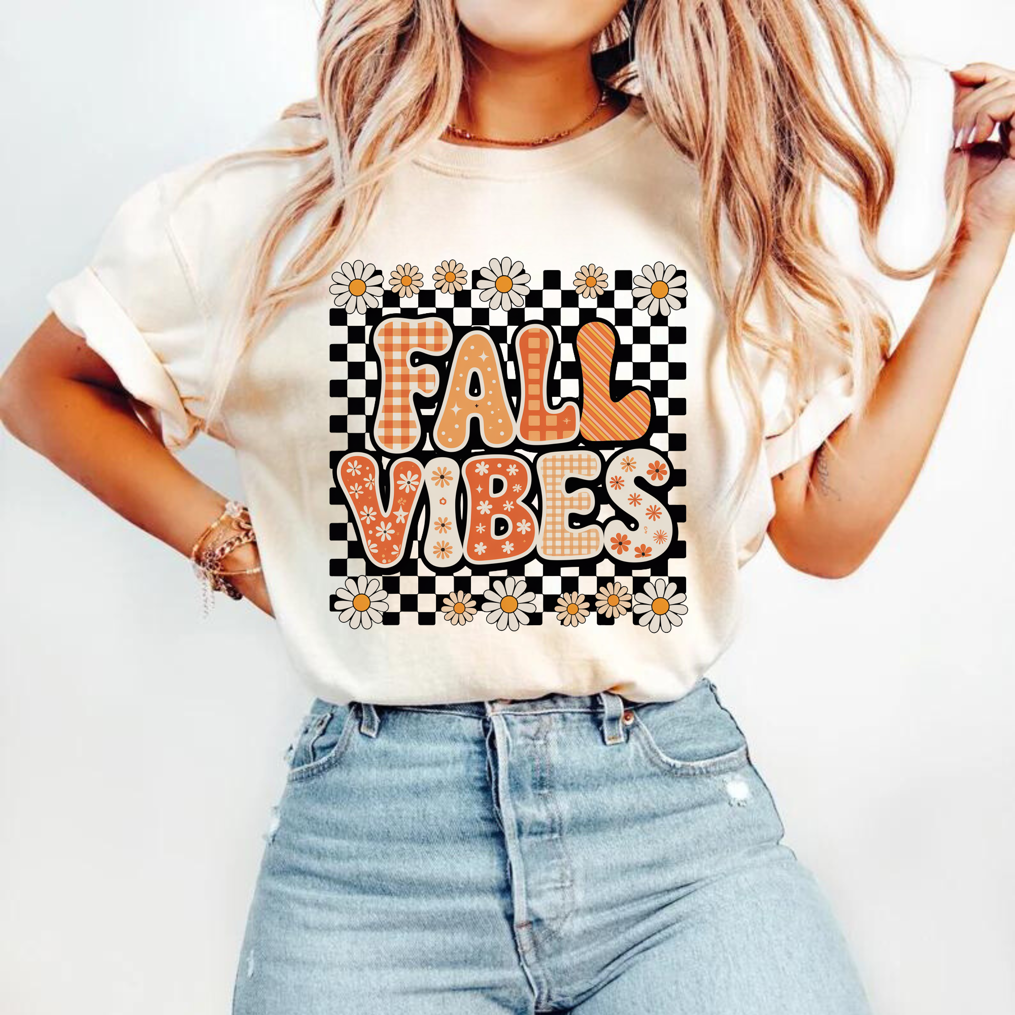 Fall Vibes retro checkered daisy DTF transfer on a cream t-shirt