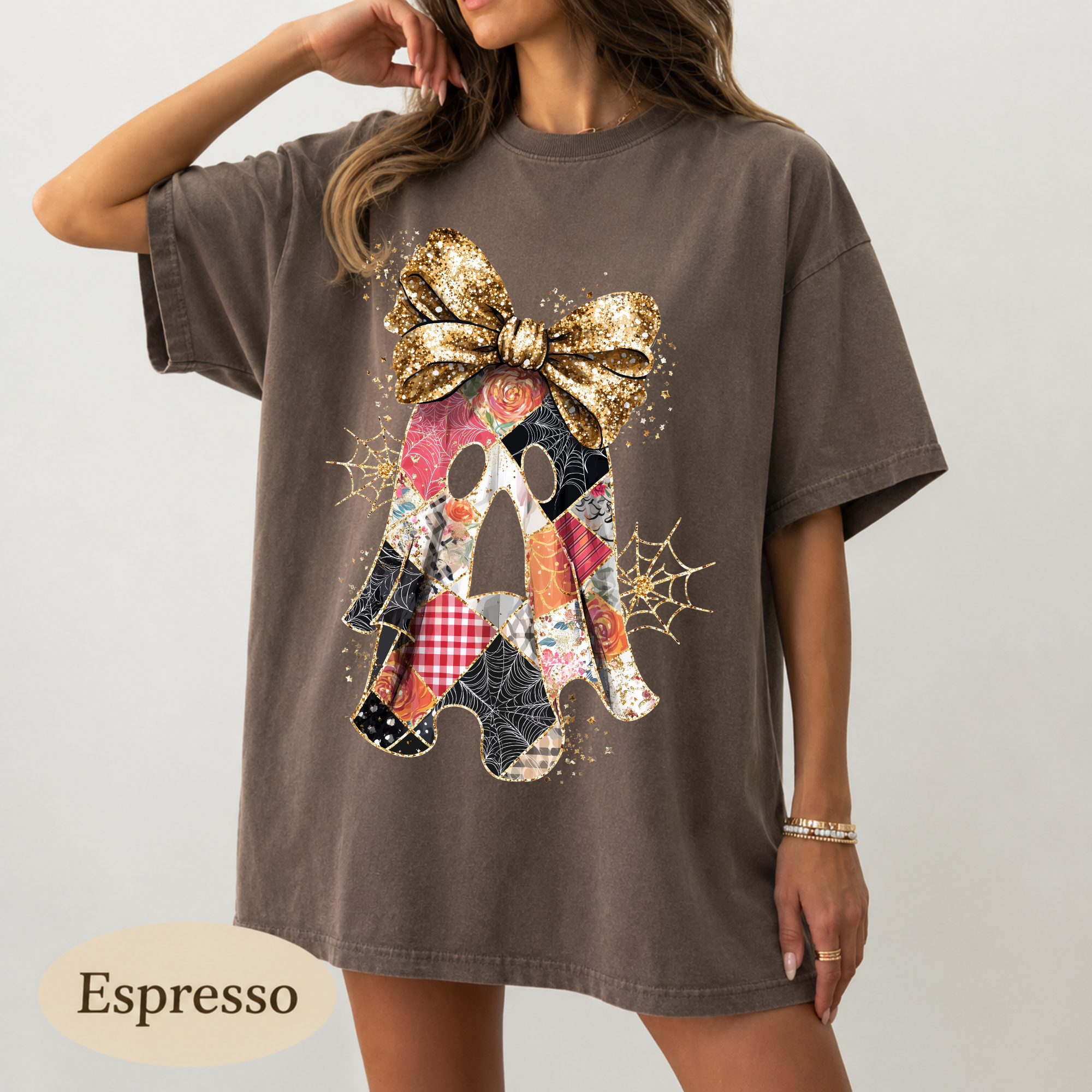 Patchwork ghost with gold glitter bow and spiderwebs DTF transfer on espresso brown Comfort Colors t-shirt