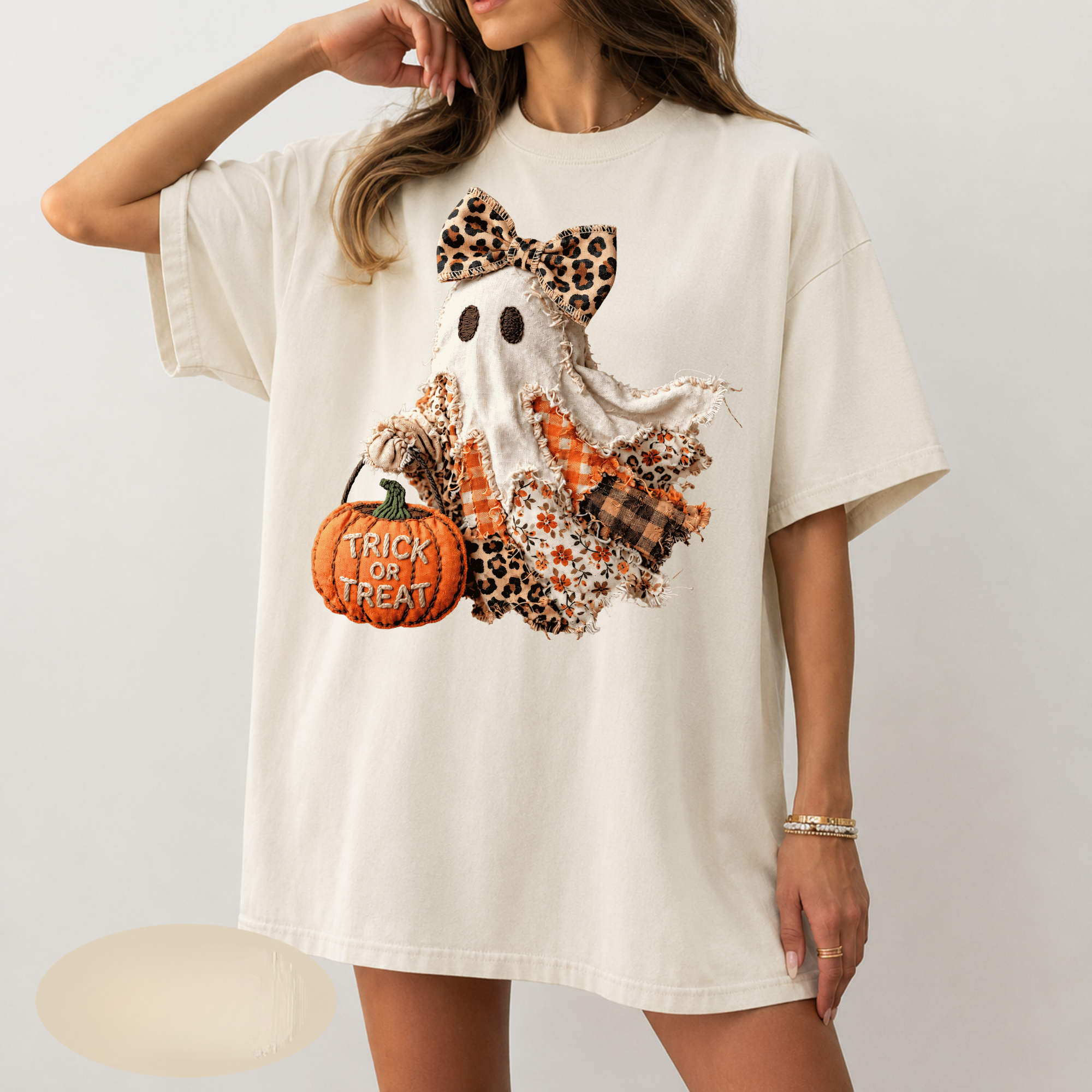 Patchwork ghost with leopard bow and trick or treat pumpkin DTF transfer on ivory Comfort Colors t-shirt