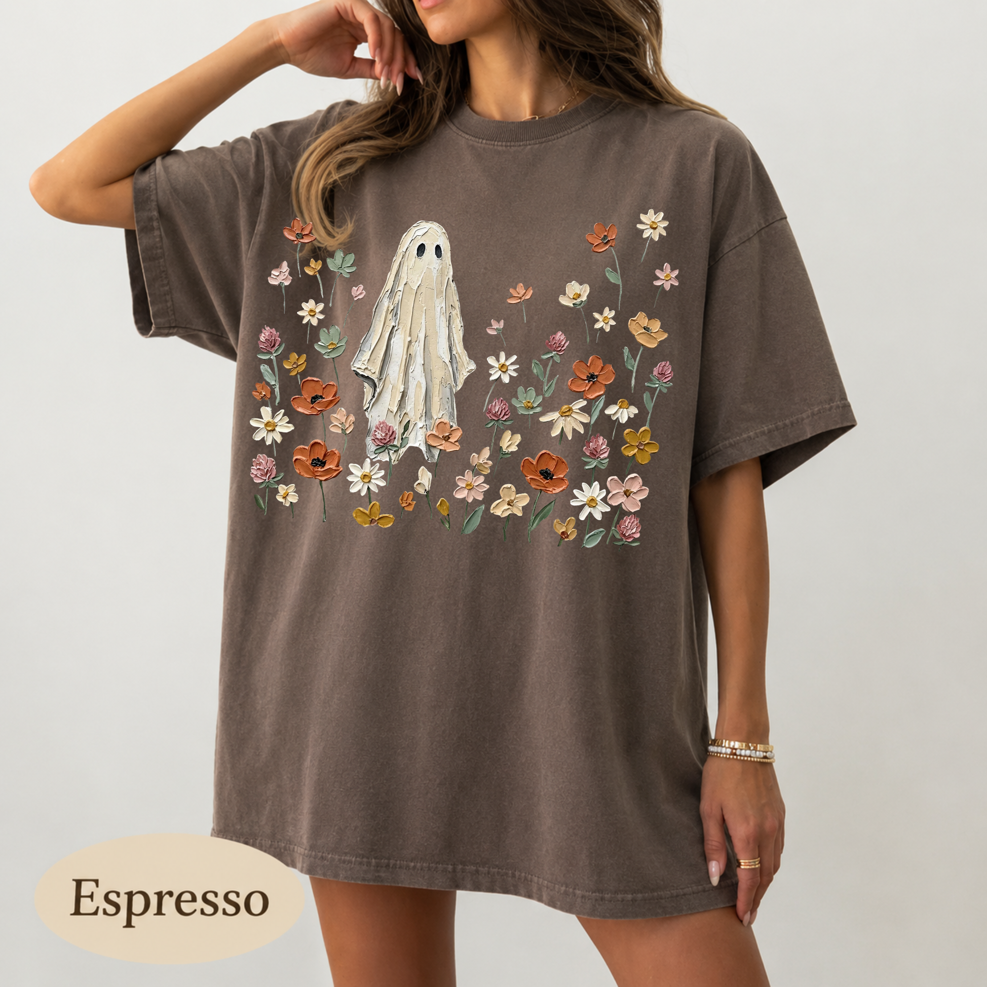 Textured ghost surrounded by wildflowers DTF transfer on espresso brown Comfort Colors t-shirt